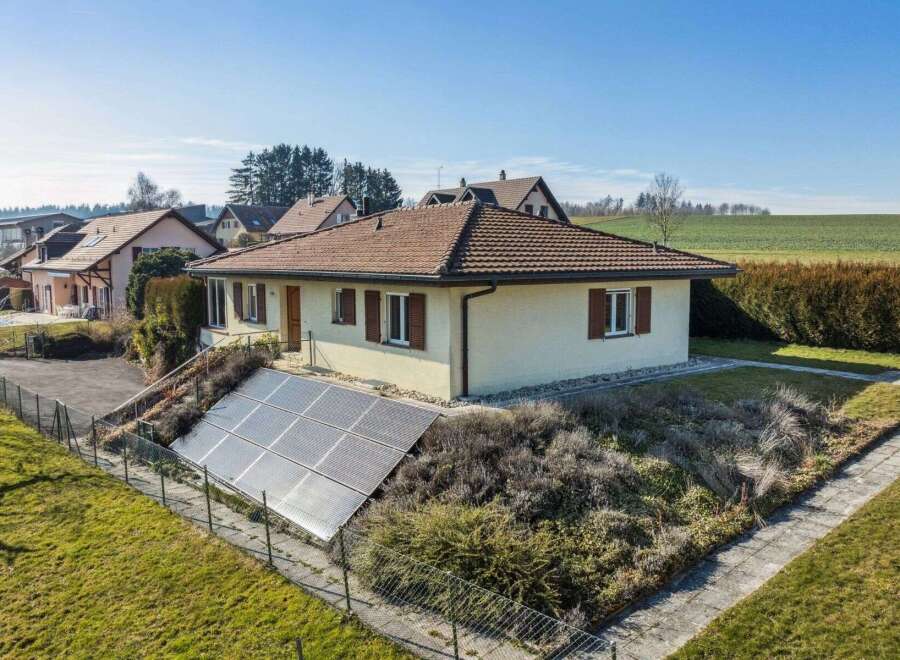 Discover this charming home featuring solar panels, offering both sustainability and style.