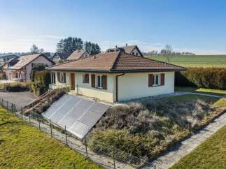 Discover this charming home featuring solar panels, offering both sustainability and style.
