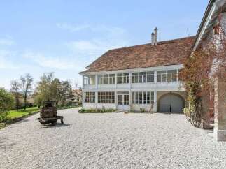 Discover the charm of this stunning property, boasting a classic architectural design and a serene setting.