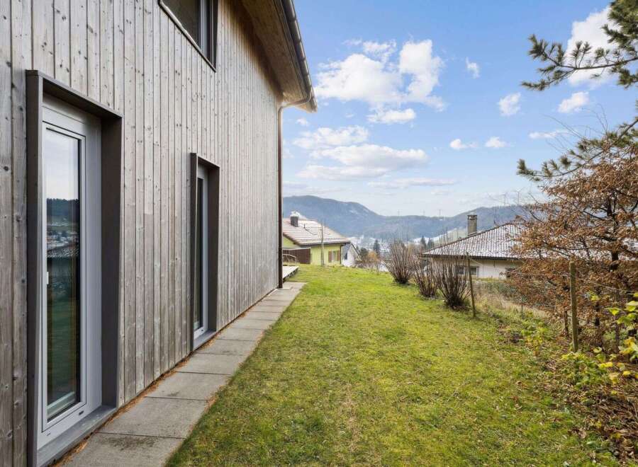 Discover this stunning property with modern architecture and a serene outdoor space.