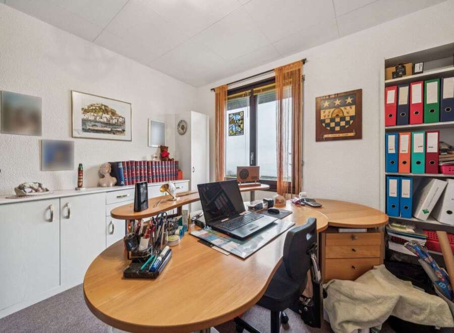 This home office offers a functional and stylish workspace.