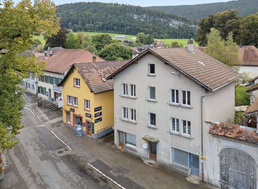 Discover charming properties in a picturesque European village setting.