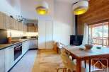 Discover the charm of this stunning property, featuring a modern kitchen with sleek countertops and ample storage.