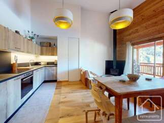Discover the charm of this stunning property, featuring a modern kitchen with sleek countertops and ample storage.