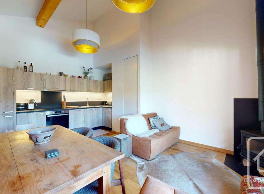 Discover the charm of this stunning property, featuring a modern kitchen with sleek cabinetry and appliances.