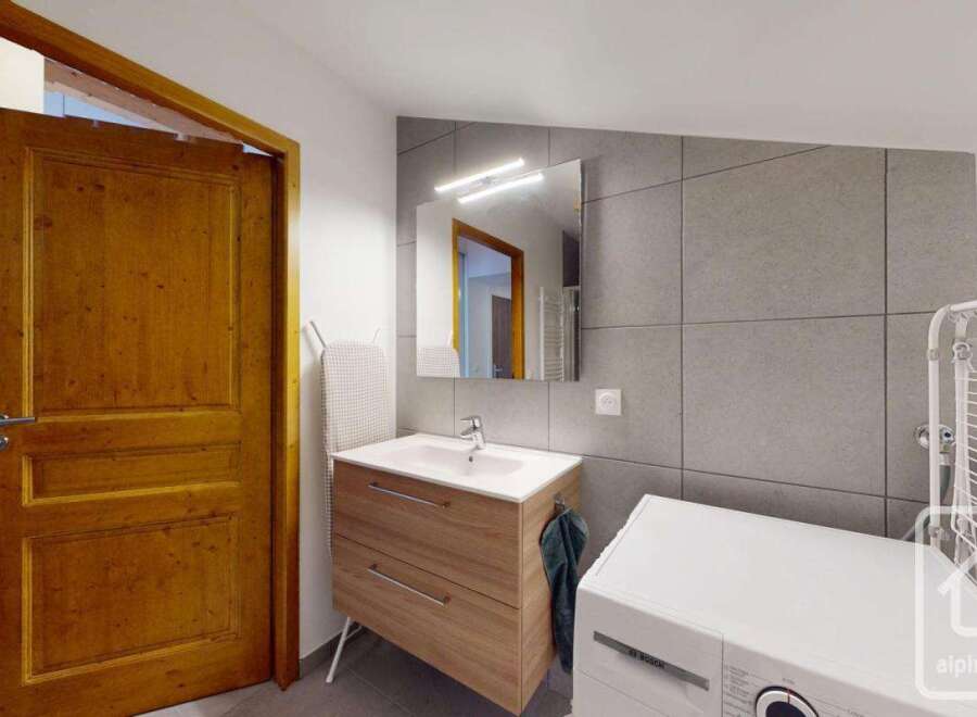 This stunning property boasts a modern bathroom design, perfect for a comfortable living experience.