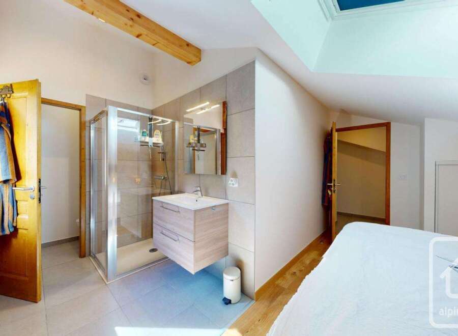 Discover this charming property featuring a well-appointed bathroom with a modern shower and vanity.
