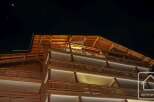 Experience luxury living in this stunning property, showcasing exquisite wooden architecture and design.
