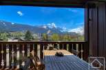 Enjoy breathtaking mountain views from this charming property.