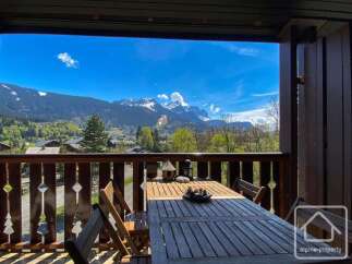 Enjoy breathtaking mountain views from this charming property.