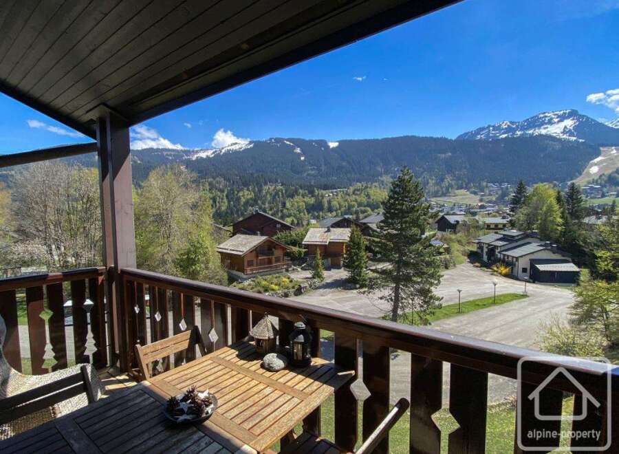 Enjoy breathtaking mountain views from this charming property.