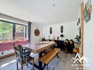 Discover this charming property featuring a spacious dining area, perfect for gatherings.