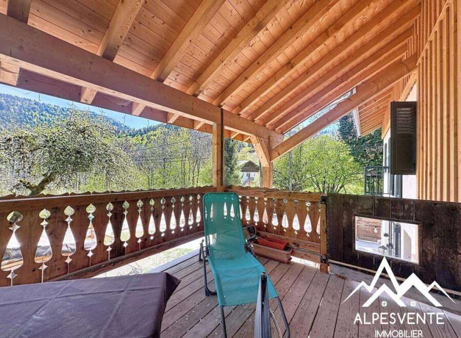 Discover the charm of this stunning property with a wooden deck and breathtaking mountain views.