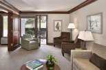 Step into luxury with this stunning living space, featuring elegant decor and ample natural light.