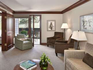 Step into luxury with this stunning living space, featuring elegant decor and ample natural light.