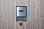 This property features a modern and stylish design, evident in the sleek door and contemporary door number.