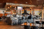 This inviting restaurant features a rustic bar area with a cozy atmosphere.