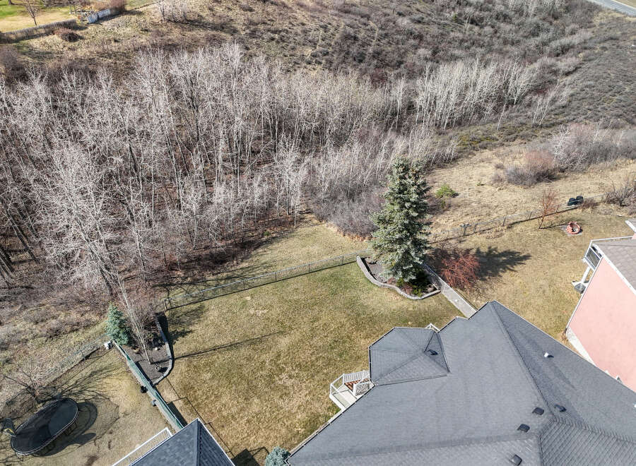 This stunning property boasts a spacious backyard, perfect for outdoor activities and relaxation.