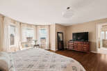 Step into luxury with this stunning bedroom featuring a spacious layout and elegant design.