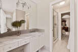 Step into luxury with this stunning bathroom! Featuring a sleek vanity, elegant lighting, and a spacious shower, this space is designed for relaxation and style.