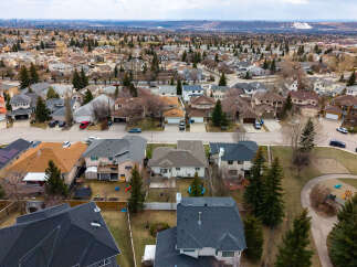 Explore this stunning residential neighborhood featuring beautiful homes with diverse architectural styles.
