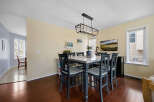 This dining room exudes elegance with its modern farmhouse aesthetic.