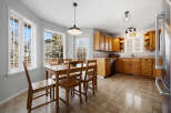 This charming kitchen boasts a warm and inviting atmosphere, perfect for family gatherings and culinary adventures.
