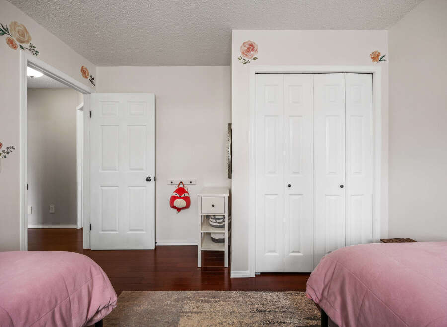 Step into this charming bedroom, perfect for a cozy retreat.