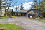 Discover this stunning property featuring a charming exterior and a welcoming driveway.