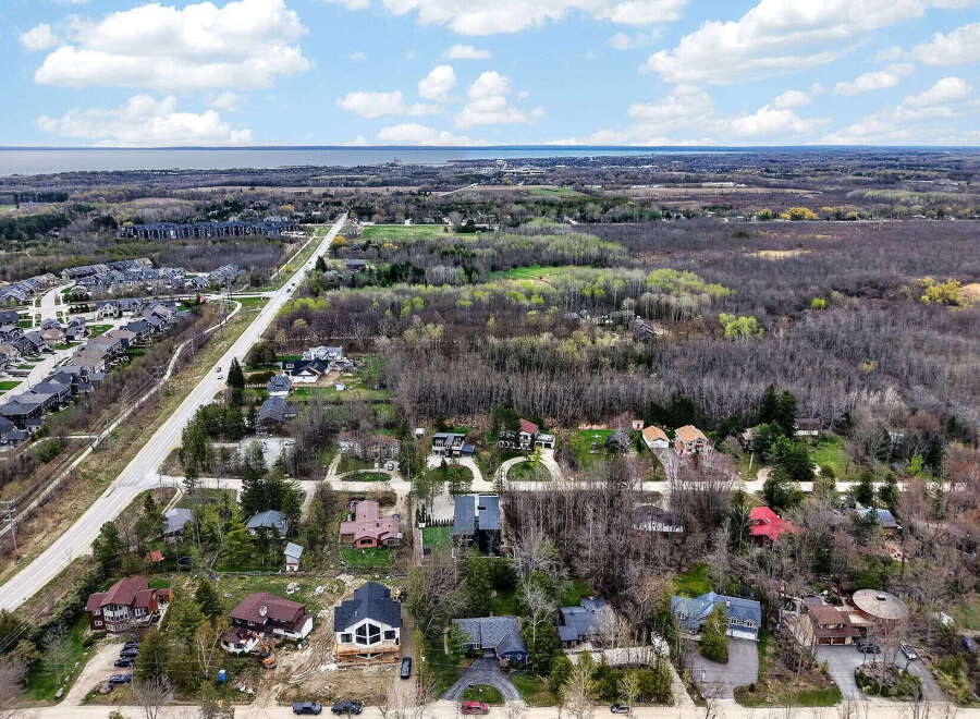 Discover the charm of this stunning property, nestled in a serene neighborhood with lush greenery.