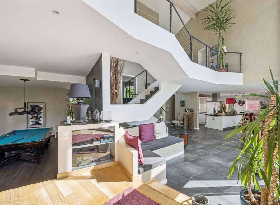 This stunning property boasts a modern design with a spacious open floor plan.
