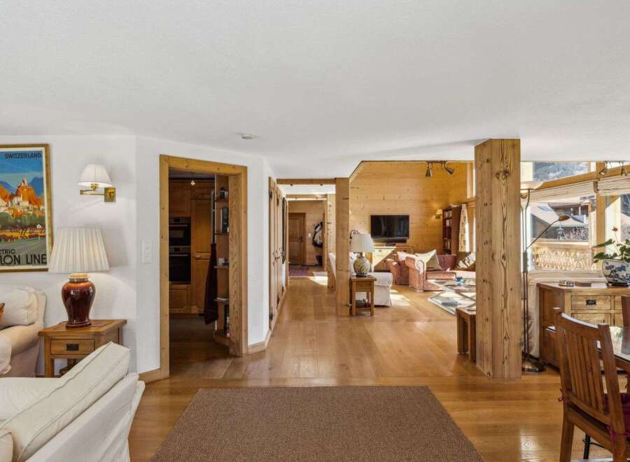 Step into luxury with this stunning property, showcasing exquisite wooden accents and a warm, inviting atmosphere.