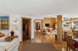 Step into luxury with this stunning property, showcasing exquisite wooden accents and a warm, inviting atmosphere.
