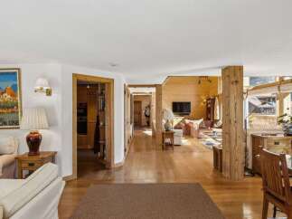 Step into luxury with this stunning property, showcasing exquisite wooden accents and a warm, inviting atmosphere.