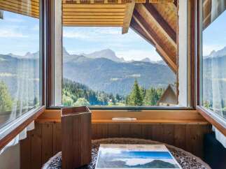 Experience breathtaking mountain views from this stunning property.