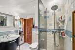 Step into this charming bathroom, featuring a blend of classic and modern elements.