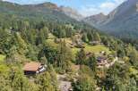 Nestled in a picturesque mountain landscape, this stunning property offers an idyllic retreat.
