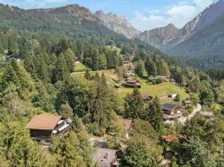 Nestled in a picturesque mountain landscape, this stunning property offers an idyllic retreat.