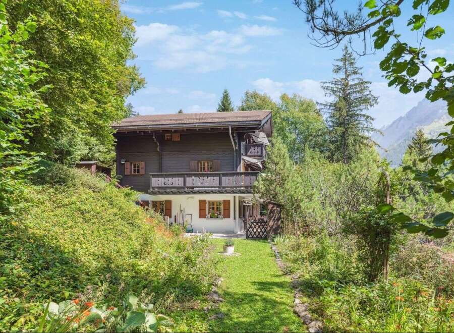 Nestled in a serene, nature-filled setting, this charming property offers a tranquil escape.