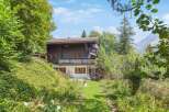 Nestled in a serene, nature-filled setting, this charming property offers a tranquil escape.