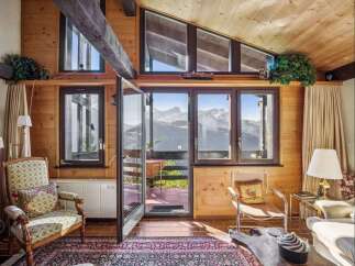 Experience breathtaking mountain views from this stunning property.