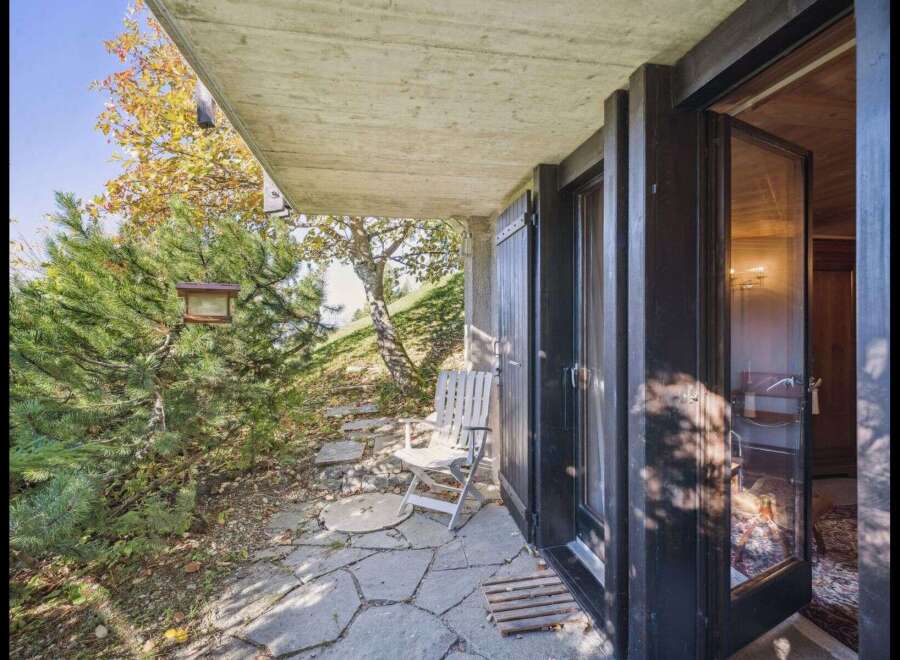 Discover a charming retreat with this property, featuring a serene outdoor space perfect for relaxation.