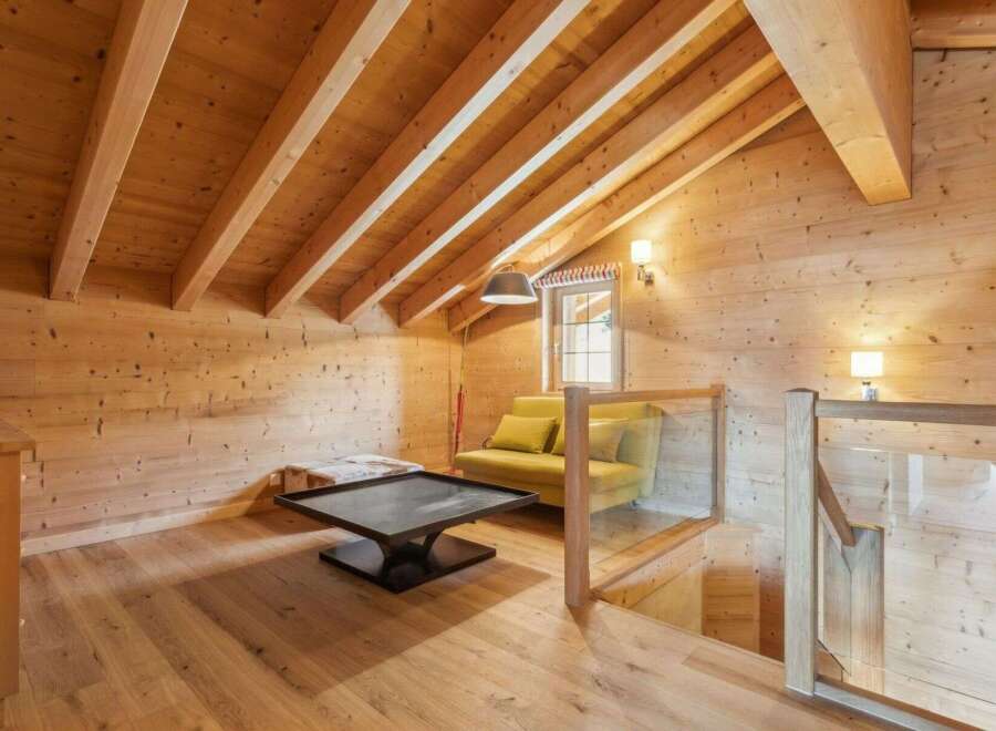 Discover the charm of this stunning wooden interior, perfect for a cozy retreat.