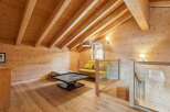 Discover the charm of this stunning wooden interior, perfect for a cozy retreat.