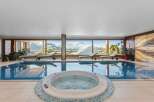 Indulge in luxury at this stunning property featuring an indoor pool and jacuzzi, perfect for relaxation.