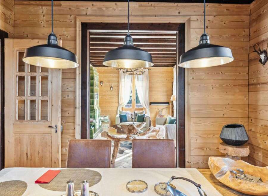 Step into rustic elegance with this stunning property, showcasing a warm and inviting interior.