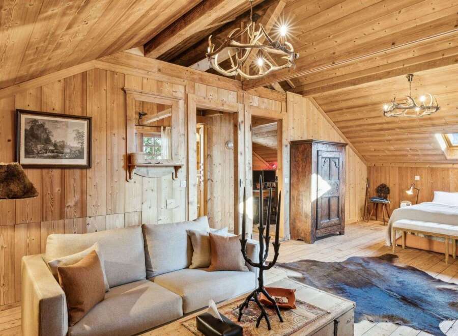 Step into rustic elegance with this stunning property, showcasing a warm, inviting interior.
