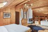 This stunning property boasts a cozy and inviting interior, perfect for a relaxing retreat.