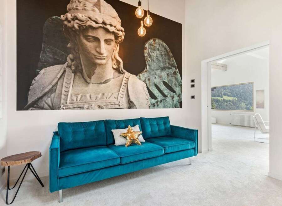 This stunning property boasts a modern living space with a touch of artistic flair.