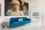 This stunning property boasts a modern living space with a touch of artistic flair.